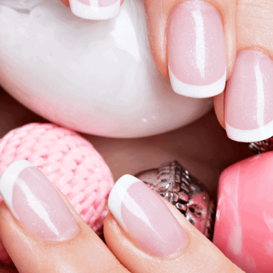 73acb3f9-beautiful-woman-s-nails-with-beautiful-french-white-manicure-1-min.png